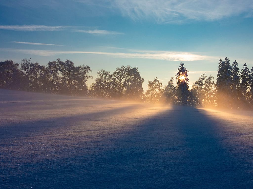 Sonnenuntergang in Schneelandschaft
